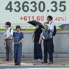 Asian shares rise after Japan's prime minister resigns
