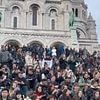 Paris' hotspot hell: Locals fear chic neighbourhood is turning into 'Disneyland' as streets overrun with tourists, gas-guzzling buses and huge queues at every patisserie