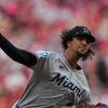 Marlins extend road winning streak to 11 with 12-2 win over Reds