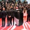 Bird man on red carpet leaves Cannes squawking