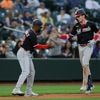 Hassell hits 1st major league homer and Nationals rout Mariners 9-0