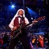 Britain at its best: Brian May, Roger Taylor, Bill Bailey and Alison Balsom lead the last night of the Proms in splendid show of national pride - just a few miles from where Tommy Robinson thugs attacked cops and called for death of the Prime Minister