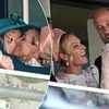 Zara Tindall and Lady Gabriella Windsor greet each other with kisses in candid show of affection at Ascot - and there's hugs for Prince William too