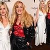 Georgia May Jagger cuts a radiant figure in a white satin slip dress as she attends party in Cannes with stylish mum Jerry Hall