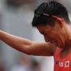 Hosts Japan celebrate first medal as athletes battle Tokyo heat