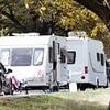 Travellers move onto road through leafy common surrounded by £5million homes, infuriating families living nearby