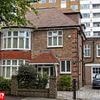 Is THIS the most overpriced semi-detached in Britain? House hunters stunned after couple put three-bed home on sale for £2M over average asking price... but neighbours say it is worth it