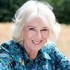 Queen Camilla beams in the sunshine in stunning portrait released by Buckingham Palace to mark her 78th birthday