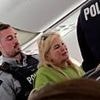 Moment 'mother and wannabe influencer daughter' are taken away by police after forcing UK flight to Jamaica to divert to Canada after parent 'shouted and swore at staff demanding to get off in mid-air'