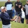 Lee Westwood's mad dash from Dallas to Dundonald pays off as he rolls back the years to secure a place at The Open