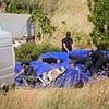 New search for Madeleine McCann ENDS with dozens of police seen packing up equipment at remote Portuguese site