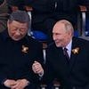 Putin and Xi defy Trump's attempts to drive them apart with show of unity at Moscow Victory Day parade - and condemn US 'golden dome' missile shield
