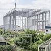Fury at 'eyesore' 200ft tall Chinese supermarket warehouse towering over housing estate - as locals insist it keeps getting BIGGER every time they open their doors