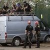 Three women are arrested on terror offences after van slammed into defence manufacturer