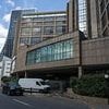 'Migrant from Canary Wharf hotel' is arrested on suspicion of common assault after allegedly entering a blind woman's flat