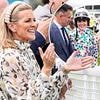 Gabby Logan, 53, excitedly cheers on her jockey daughter Lois, 20, alongside her husband Kenny as she makes her racing debut at Goodwood