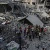 Israeli air strikes overnight kill 100 Palestinians across the Gaza strip as ceasefire talks appear to stall
