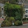 Inside the story of Britain's messiest garden: How recluse's overgrown jungle engulfed his home and TWO vans... but what does it look like now?