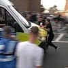 Met confirms police van 'made contact' with protester at anti-migrant demo when thugs clashed with officers near asylum hotel after Ethiopian resident was charged over schoolgirl sex assault