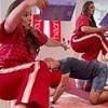 Kelly Brook topples over and ends up in a 'neck brace' after TikTok trend appears to go very wrong