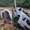 At least 14 dead in South Korea floods and landslides