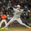 Flores hits 3 homers and drives in 8 runs to back Webb as Giants thump A's 9-1