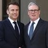 Hand back our £771MILLION Mr Macron.. s'il vous plait: French President to face questions over his country's failure to dent small boat crisis as he arrives in Britain