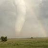'Spectacular' moment an enormous tornado crosses a rainbow