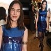 Alexa Chung puts on a racy display in a blue sheer PVC dress as she attends Vogue event in London
