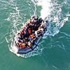 English Channel migrant boat blaze leaves one dead and seven injured when motor catches fire during crossing