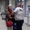 Moment Ryanair passenger SOBS after being stopped from boarding plane because her 'hand luggage was too large'