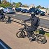 Moment road safety vigilante Cycling Mikey confronts two 'mobile phone thieves' on e-bikes... before they turn the tables on him