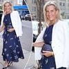Beaming Duchess of Edinburgh dons glamorous navy gown as she kicks off four-day tour of Canada with glitzy dinner event