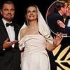 Leonardo DiCaprio joined by Juliette Binoche as he presents close friend Robert De Niro with honorary Palme d'Or award at Cannes Film Festival