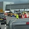 Car plunges off multi-storey car park at Luton Airport: Man is rushed to hospital with 'serious' injuries
