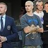 David and Romeo Beckham appear tense as they watch Inter Miami take on Nashville SC - days after the model blocked brother Brooklyn and his wife Nicola on Instagram as family rift deepens