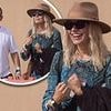 Holly Willoughby makes a rare appearance with husband Dan Baldwin as she opts for a chic paisley dress for the final day of sun-soaked Glastonbury