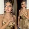 Nepo baby with famous British mother stuns in gold minidress - can you guess who she is?
