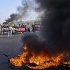 Scores of Palestinians killed and thousands flee after Israel launches fresh airstrikes and announces plans to capture Gaza's largest city