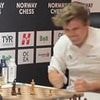 Moment 'world's greatest' chess player loses his composure and slams his fist into the table after losing game