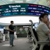Asian shares are mixed after Wall Street sets more records for US stocks