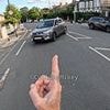 Bike vigilante Cycling Mikey returns to scene where he pushed his bike in front of a car to perform same stunt AGAIN