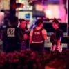 Police officer among four dead in shooting at New York City office building