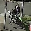 Shocking moment biker, 21, drags brave police officer across road as he tries to arrest him over dangerous town centre wheelies