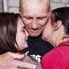 Homecoming Ukrainian soldiers are embraced by families after latest prisoner exchange with Russia - hours after Putin's army launched huge drone attack