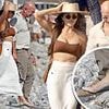 Lauren Sanchez ditches the heels after struggling to stay on her stiletto-clad feet during treacherous walk across a pebble beach - as she joins husband Jeff Bezos, Leonardo DiCaprio and Vittoria Ceretti for another double date in Ibiza