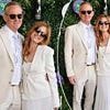 Isla Fisher is absolutely glowing as she steps out at Wimbledon with handsome date on her arm after finalising her divorce from Sacha Baron Cohen