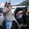 Outrage as sheriff's office swoops in to arrest murder suspect at FUNERAL...but they made a terrible mistake
