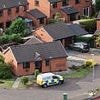 Mother, 47, is charged with murdering her own three-year-old daughter after girl's body was found in house on quiet cul-de-sac