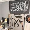 Terrorist's arsenal of weapons: Secret cache including a machete and an axe were hoarded by former student found guilty of possessing bomb-making video